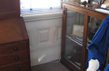 Interior water damage to wood panels in the Reading Room of the Houghton Memorial Building